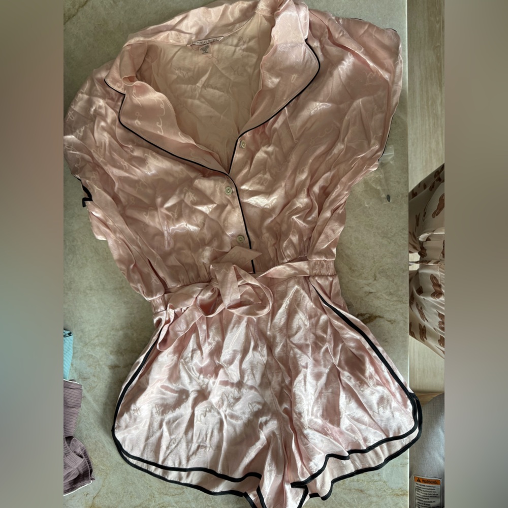 Victoria’s Secret Romper Pajama, new without tags. Smoke free pet free home.